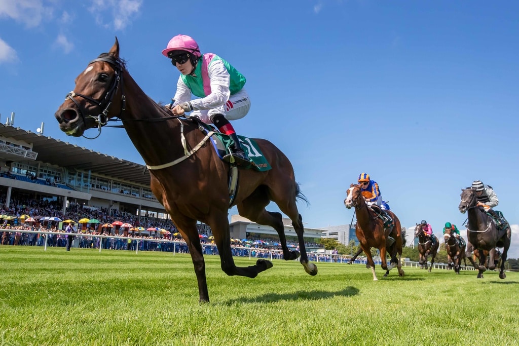 Jockey Colin Keane celebrates a winning ride at the Curragh racecourse in Kildare